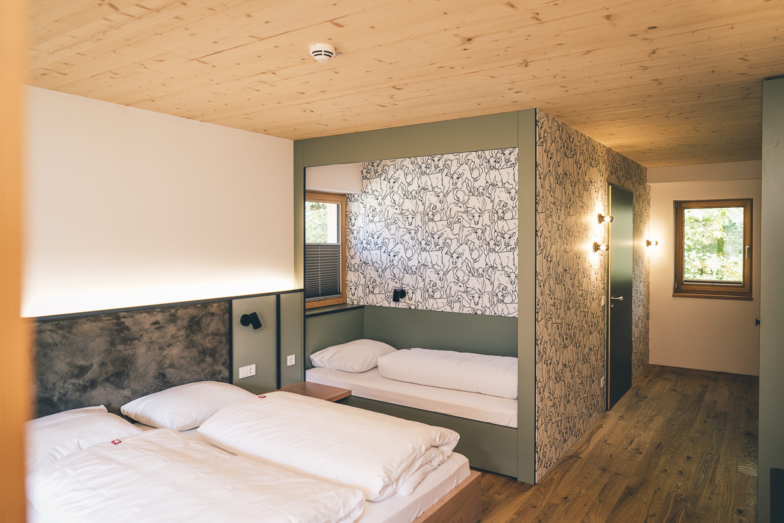 Deluxe Mehrbettzimmer